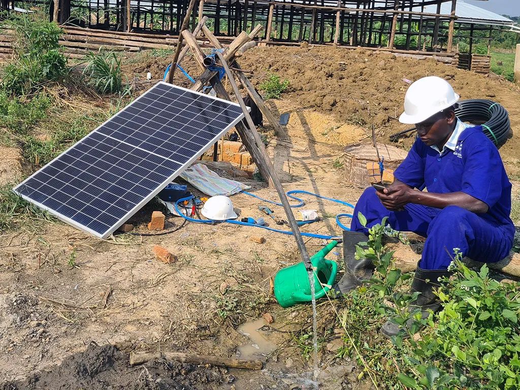 Solar array powering a rural water point